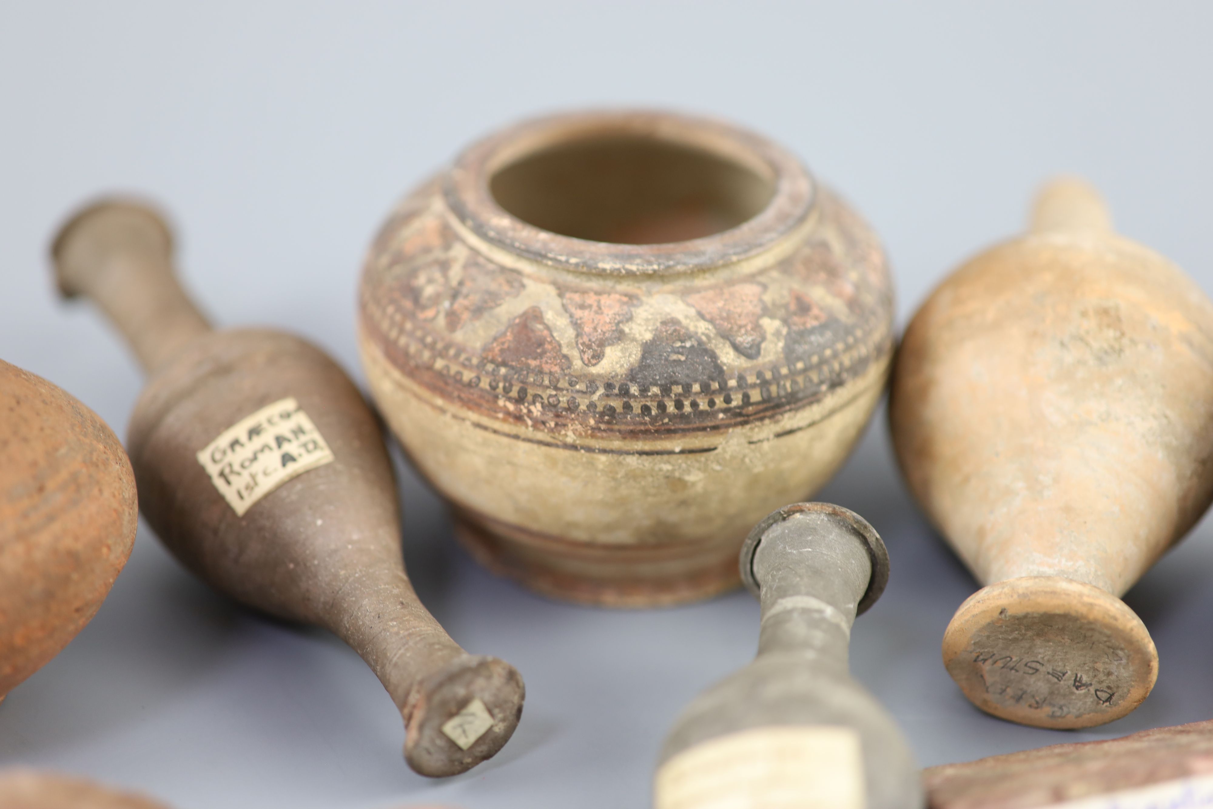 A group of Ancient Roman pottery vessels and a bronze statuette of Venus, mostly 1st-4th century AD, Provenance - A. T. Arber-Cooke